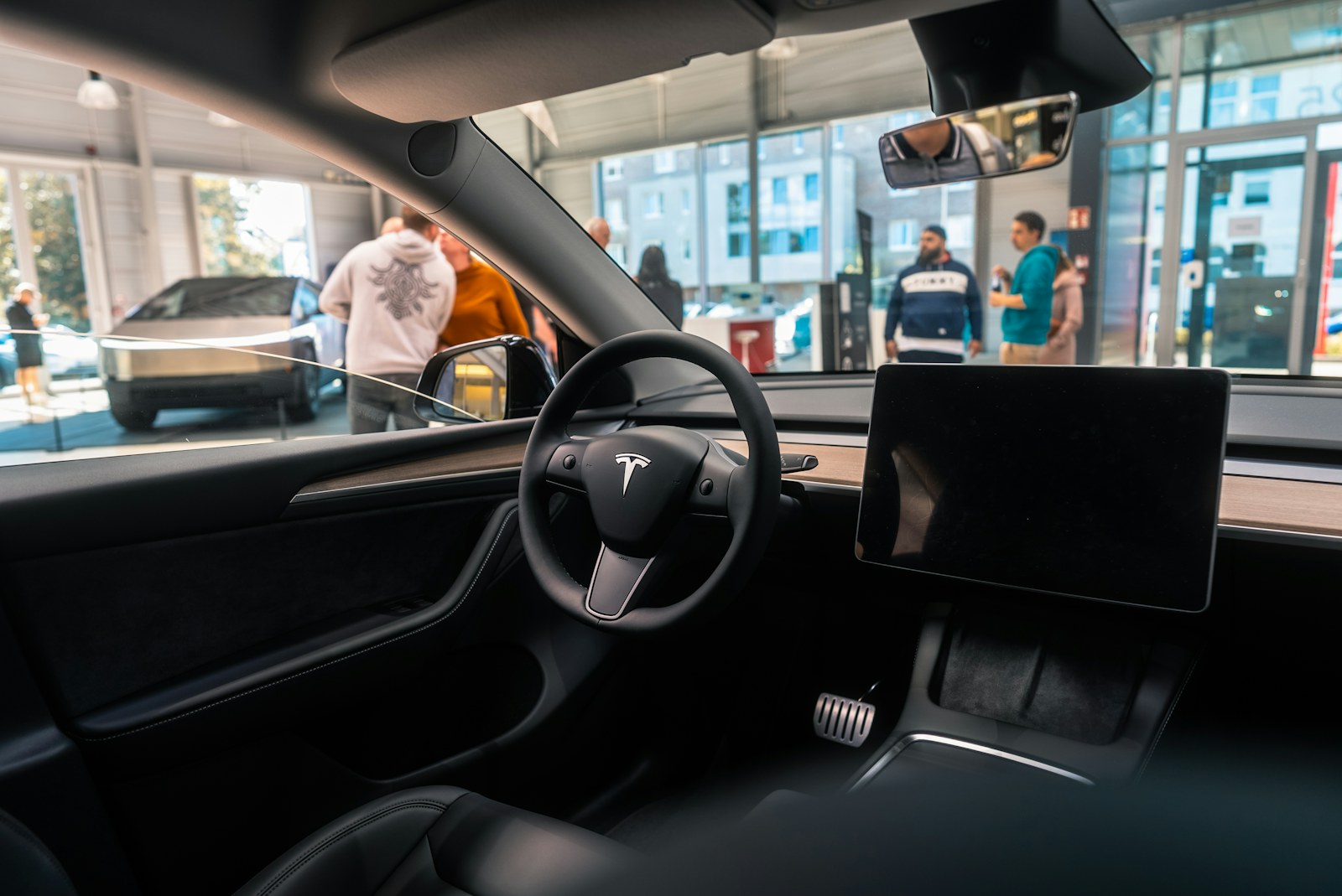 Tesla Model Y interior view used to explain HW3 versus HW4 FSD hardware differences